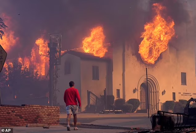 Person watching a building burn