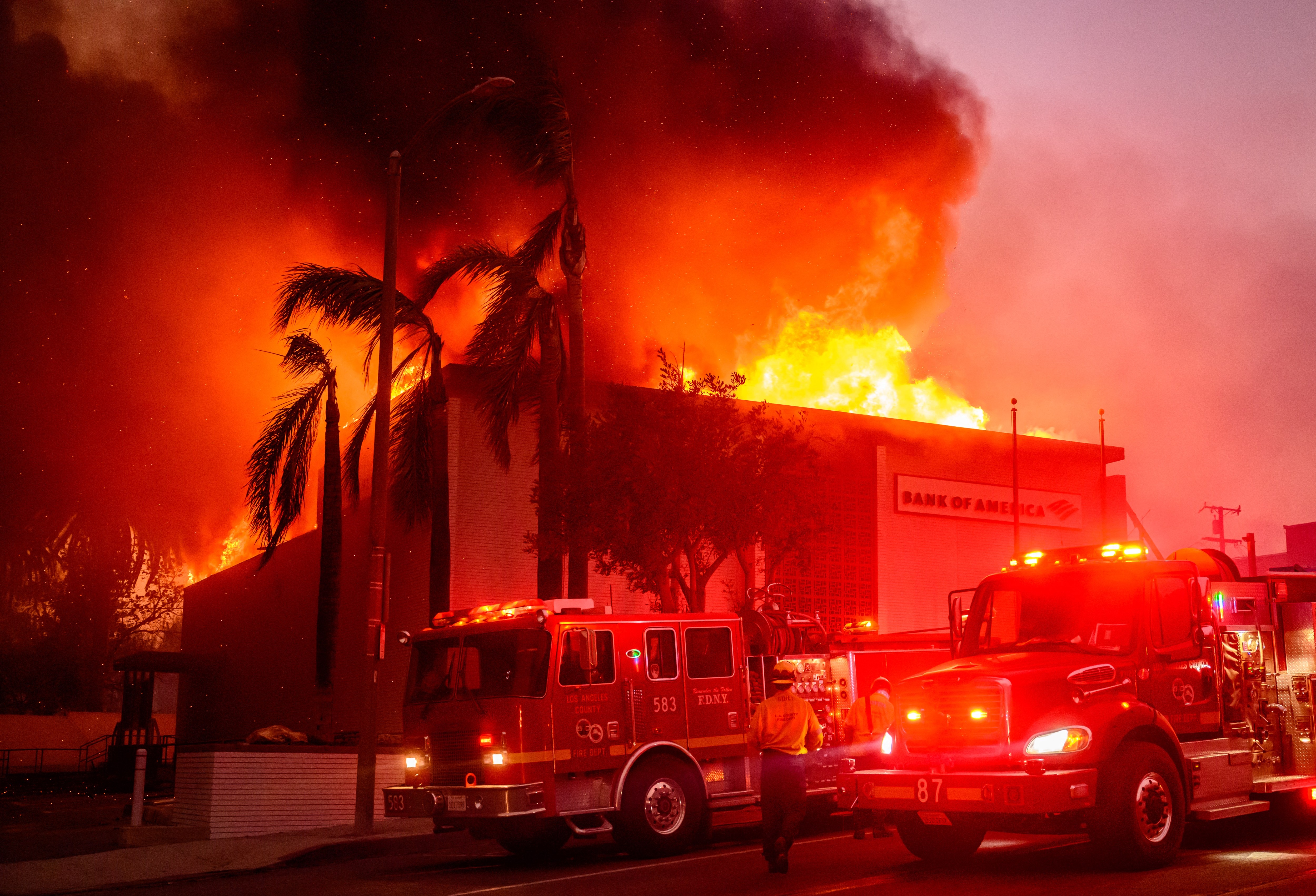 Fire trucks responding to a burning Bank of America building