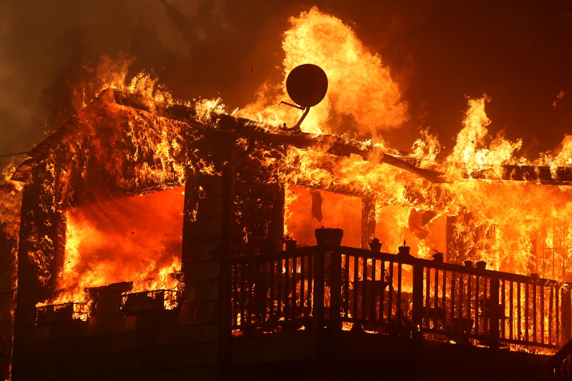 House completely engulfed in flames